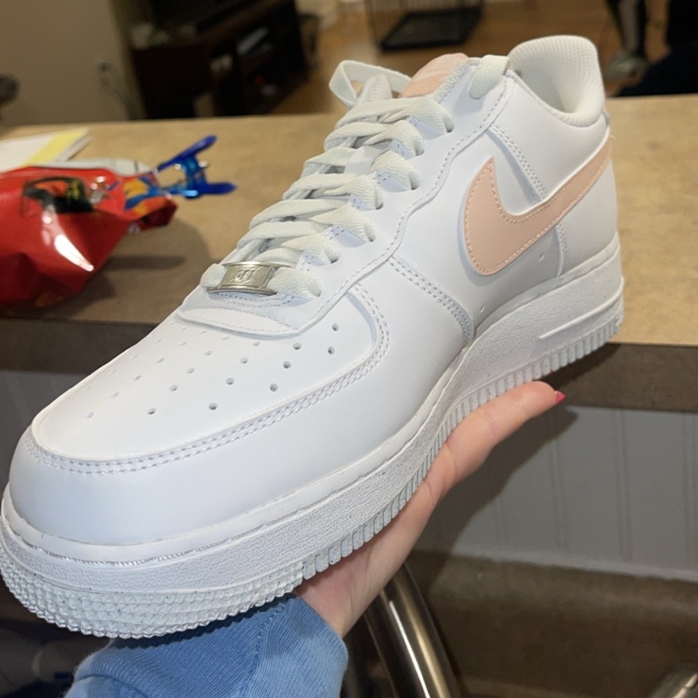 Nike White Low-Top Sneakers with Pale Pink Swoosh